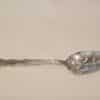 silver slotted serving spoon